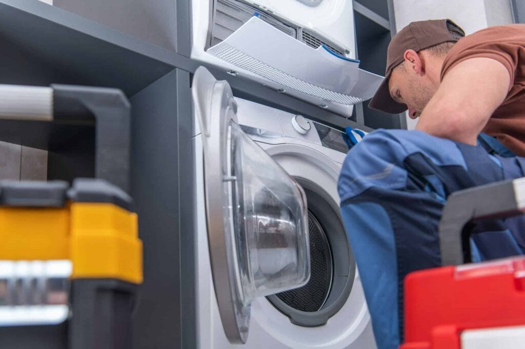 broken washing machine and problem fixing by technician
emergency appliance repair, appliance repair, urgent appliance repair, same-day appliance service, Romano’s Appliance Repair